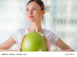 Ball being held by woman