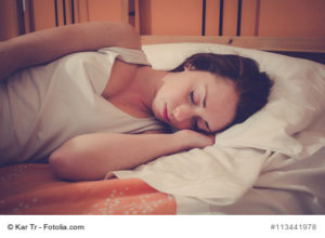 sleeping woman on bed
